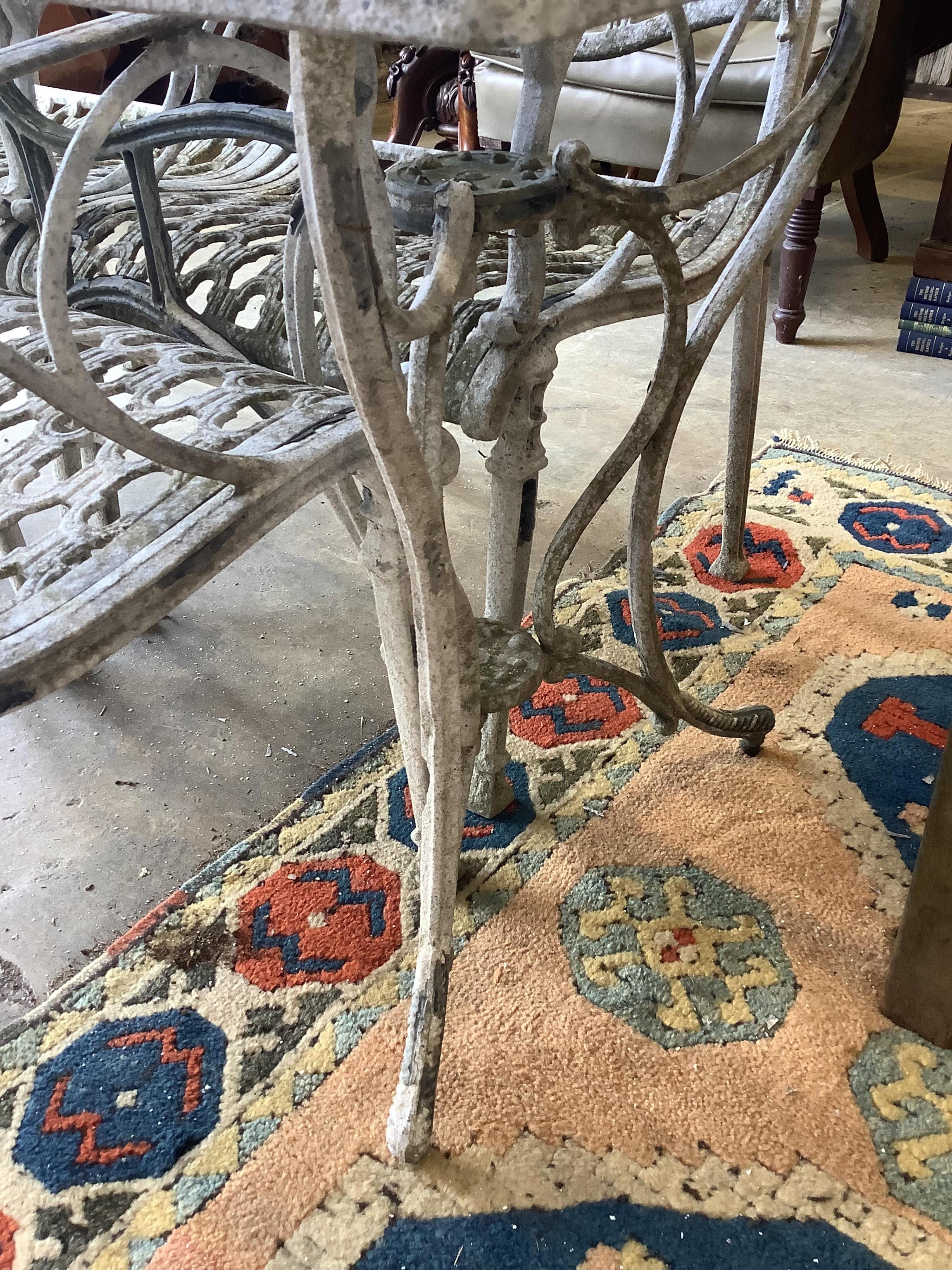 A rectangular painted aluminium garden table, width 177cm, depth 80cm, height 73cm, five matching elbow chairs and bench
